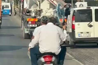 Bursa'da tehlikeli yolculuk! Trafikte vantilatörlü bisiklet kamerada