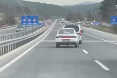 Bursa'da şehirlerarası yolda bozulan otomobili böyle çekti