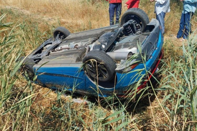 Takla atan otomobilden yaralı olarak kurtuldu