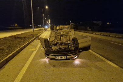 Ters dönen otomobilden yara almadan çıktı