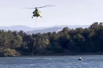 Gölette tehlikeli anlar: Helikopter su aldı, balıkçı zor anlar yaşadı