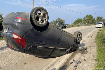 Bursa'da otomobil takla attı, emniyet kemeri sayesinde kurtuldular