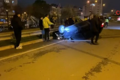 Bursa'da kontrolden çıkan otomobil takla attı