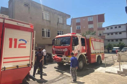 Alanya'da 3 katlı binada yangın paniği