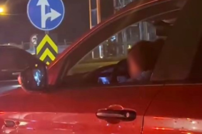 Bursa'da kucağında çocukla araç kullandı