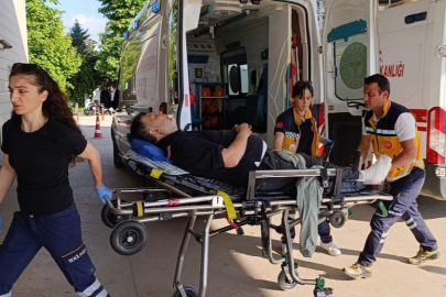 Bursa'da üzerine iş makinesi devrilen işçi yaralandı