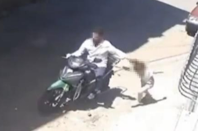Küçük kızını motosikletle sürükleyen baba gözaltına alındı
