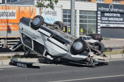 Takla atan otomobilden burnu bile kanamadan çıktı