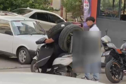 Kuryenin ilginç taşıma yöntemi kameraya yansıdı