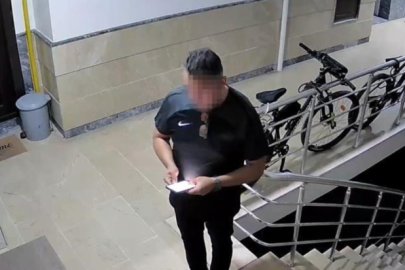 Eşini öldürmek için geldiği binada görevlinin eşini öldürdü
