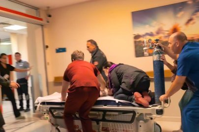 Bursa'da sedye üzerinde hayata döndürme çabası