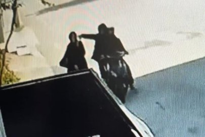 Bursa'da telefonla konuşurken kapkaça uğradı