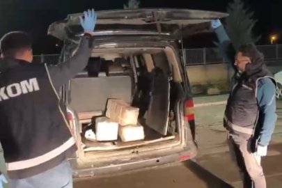 Özenle paketlenmiş kutulardan cephanelik çıktı