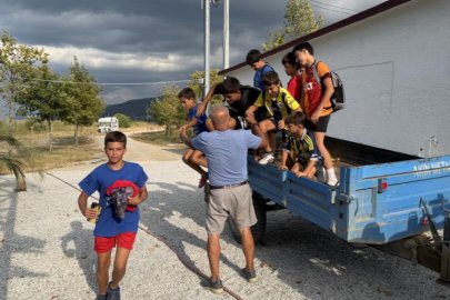 Bursa'da çocuklar için traktörünü spora sürüyor